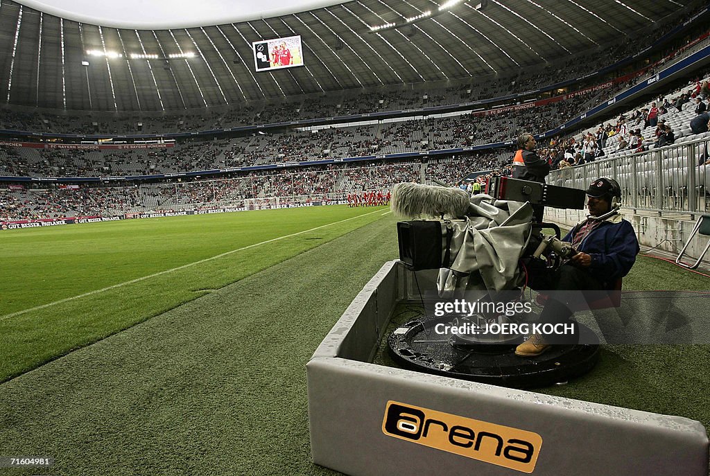 A cameraman of the new Bundesliga broadc