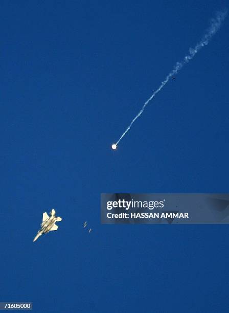 An Israeli warplane drops missiles over Burj al-Shemali, three kms east of the southern Lebanese port city of Tyre 08 August 2006. The Israeli air...