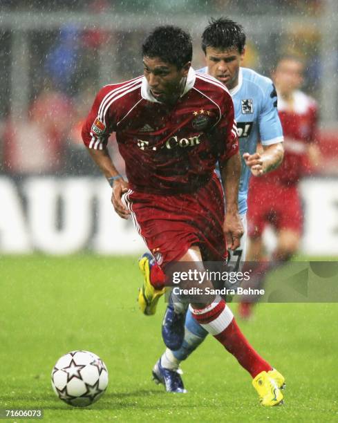 Giovane Elber of Bayern runs with the ball during the Giovane Elber farewell match between Bayern Munich and 1860 Munich at the Allianz Arena on...