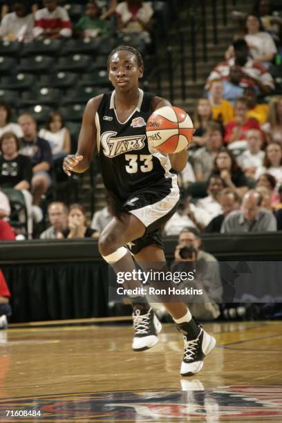 Sophia Young of the San Antonio Silver Stars drives against the Indiana Fever during the game on August 5, 2006 at Conseco Fieldhouse in...