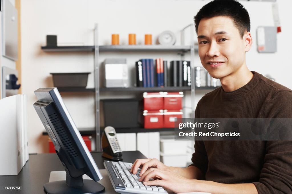 Portrait Of A Businessman Using A Computer High-Res Stock Photo - Getty ...