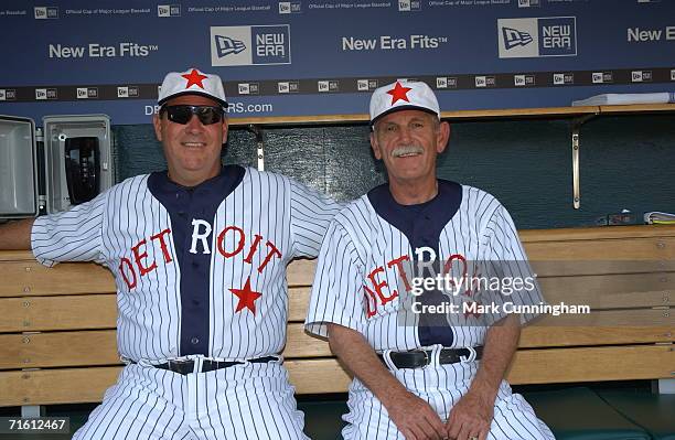 Pitching Coach Chuck Hernandez and Manager Jim Leyland of the Detroit Tigers sit in their Detroit Stars Negro League Uniforms prior to the game...