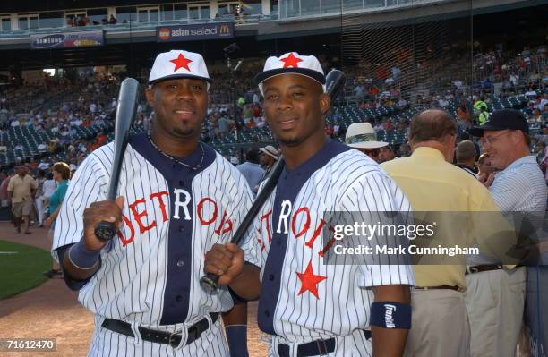 Marcus Thames and Craig Monroe of the Detroit Tigers pose in their Detroit Stars Negro League uniforms prior to the game against the Kansas City...