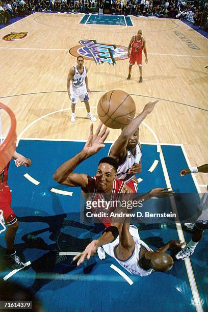 Scottie Pippen of the Chicago Bulls attempts a layup against Bryon Russell of the Utah Jazz during Game 2 of the 1998 NBA Finals played June 5, 1998...