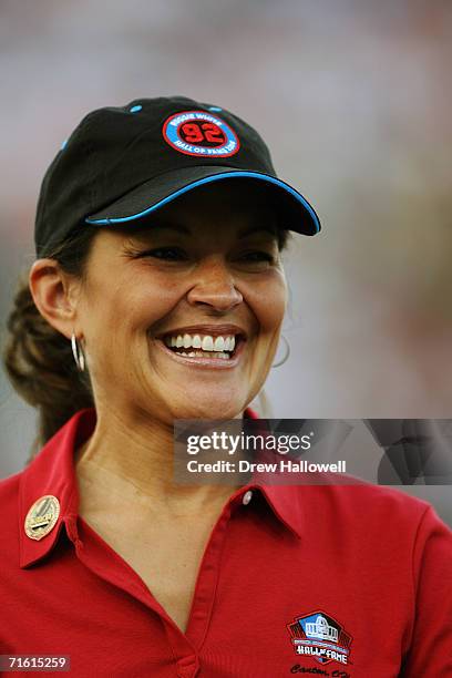 Sarah White, wife of hall of fame defensive end Reggie White walks onto the field on August 6, 2006 in the AFC-NFC Pro Football Hall of Fame Game at...