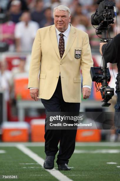 Hall of fame coach and announcer John Madden walks onto the field on August 6, 2006 in the AFC-NFC Pro Football Hall of Fame Game at Fawcett Stadium...