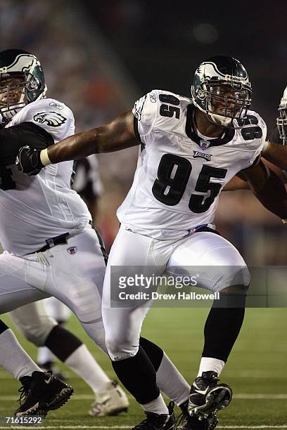 Defensive end Jerome McDougle of the Philadelphia Eagles drives into the offensive line on August 6, 2006 in the AFC-NFC Pro Football Hall of Fame...