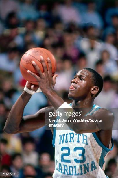 Michael Jordan of the University of North Carolina Tar Heels shoots a free throw during a game at the Carmichael Auditoriumin circa February, 1984 in...