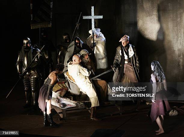Actor Robert Doelle in the role of Siegfried and Annika Pages as Bruenhild perform a scene of the Nibelung saga during a rehearsal 09 Augsut 2006 in...