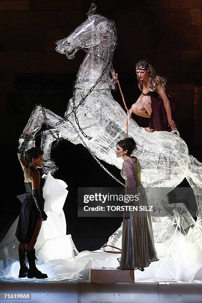 Actresses Sonja Kirchberger in the role of Isolde, Annika Pages as Bruenhild and Jasmin Tabatabai as Kriemhild perform a scene of the Nibelung saga...