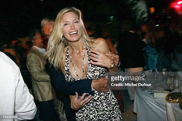 Kelly Emberg and George Hamilton attend the Fawaz Gruosi Birthday Party at the Billionhaire on August 8, 2006 in Porto Cervo, Sardinia.