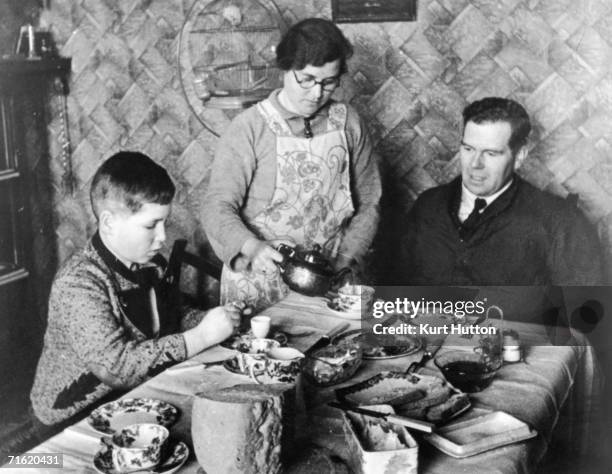 Year-old Otto Busch from Vienna moves in with Mr G. Guest, a British lorry driver, and his wife, at the start of World War II, 1939. This was...