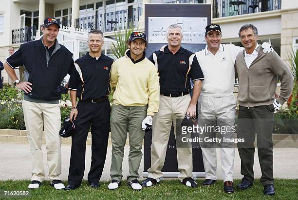 Eric van der Poele, Jan Lammers, Pierluigi Martini, Dereck Warwick, Nigel Mansell and Riccardo Patrese pose for a picture at Whittlebury Golf and...