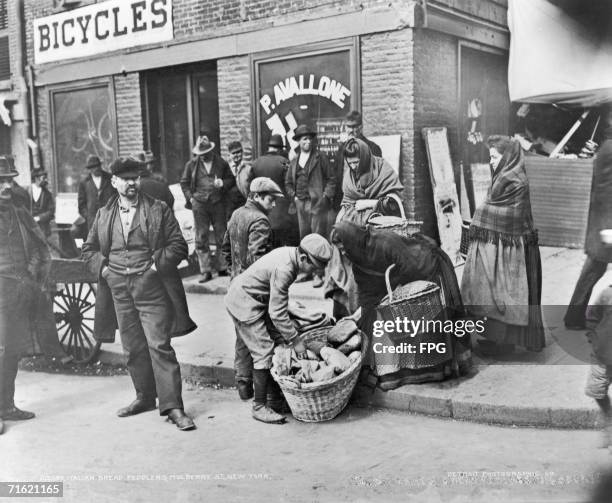 Italian bread peddlers in Mulberry Street, in the Little Italy area of New York City, circa 1910.