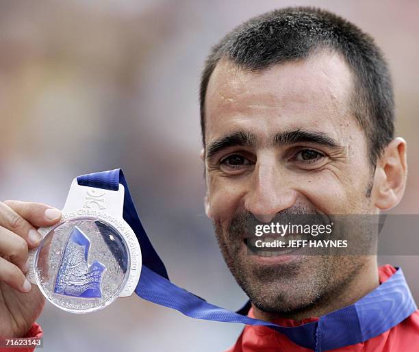 Spain's Jesus Garcia celebrates on the podium after wiining the second place of the Men's 50km the 19th European Athletics Championships in...