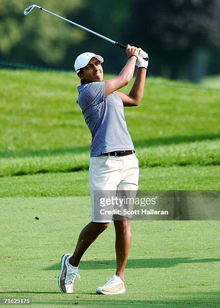 Salimah Mussani of Canada watches her approach shot on the 15th hole during the first round of the CN Canadian Women's Open at the London Hunt and...