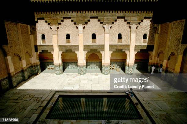 central courtyard from second floor student's cell at ali ben youssef medresa, marrakesh, morocco - abundance tiles stock pictures, royalty-free photos & images