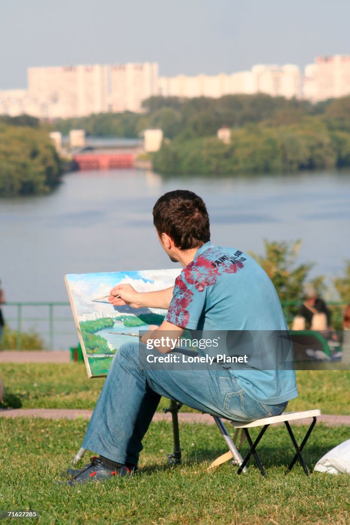 Landscape artist painting at Kolomenskoe, Moscow, Russia