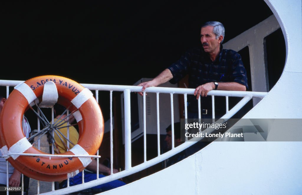 Passenger on ferry on Golden Horn, Istanbul, Turkey