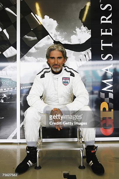 Damon Hill poses in the garage during testing for the GP Masters of Great Britain at Silverstone Circuit on August 10 in Silverstone, England.