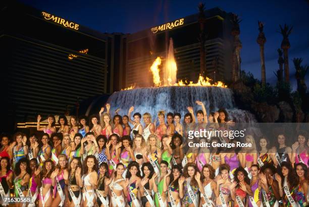 Miss Universe contestants from around the world pose in front of the Mirage Hotel for a 1991 group photo in Las Vegas, Nevada.