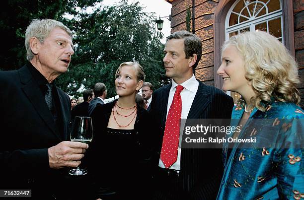 Klaus Bresser , TV journalist Claus Kleber and his daughters Alexandra and Caterine attend the premiere of the Nibelungen Festival on August 11, 2006...
