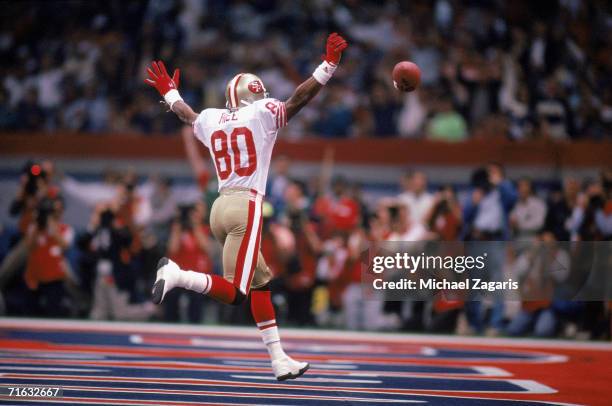 Wide receiver Jerry Rice of the San Francisco 49ers celebrates after scoring a touchdown against the Denver Broncos during Super Bowl XXIV at the...