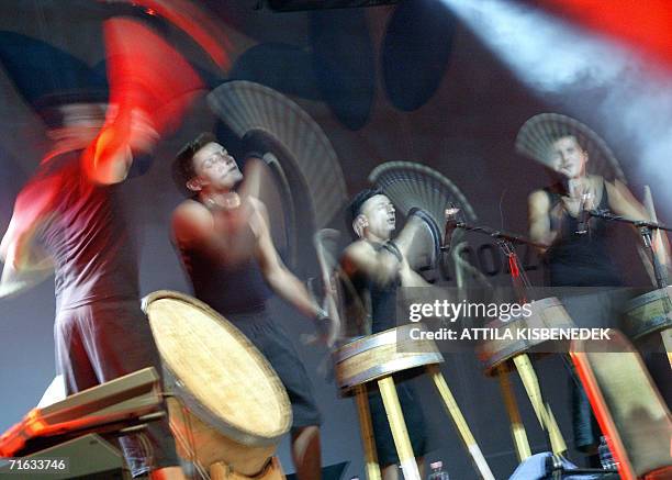 The most prestigious percussion rythm band of the area, the 'Bottari di Portico' perform with saxophonist-singer from Naples Enzo Avitabile of Italy...