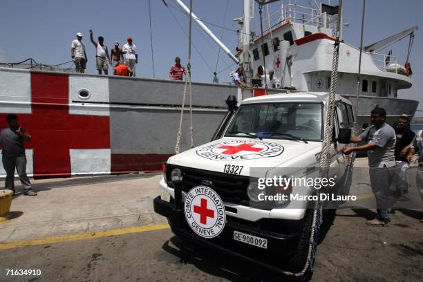 Red Cross vehicle is unloaded from the International Committee of the Red Cross ship Georgios K at the city port on August 12, 2006 in Tyre, Southern...