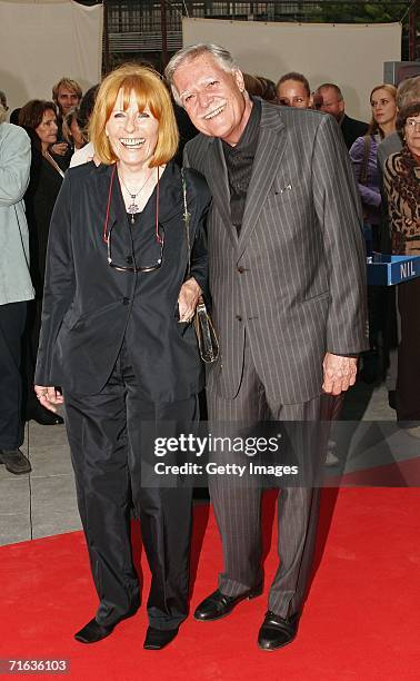 Cinematographer Michael Ballhaus and his wife Helga attend the premiere of the play "Die Dreigroschenoper" at the Admiralspalast August 11, 2006 in...