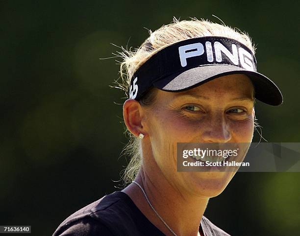 Angela Stanford smiles as she walks off the sixth green during the third round of the CN Canadian Women's Open on August 12, 2006 at the London Hunt...