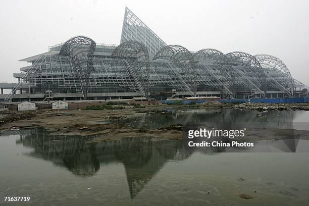 View of the Taida Resident Cultural Square under construction at Binhai New Area on August 12, 2006 in Tianjin Municipality, a megacity neighbouring...