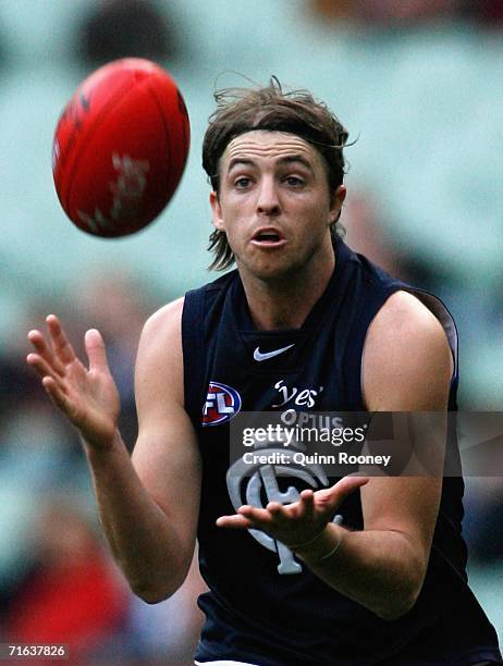 Matthew Lappin of the Blues marks during the round 19 match between the Hawthorn Hawks and the Carlton Blues at the Melbourne Cricket Ground on...