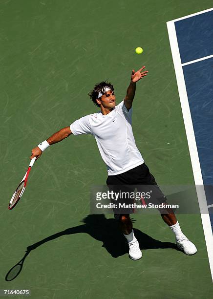 Roger Federer of Switzerland serves to Richard Gasquet of France during the final of the Toronto Masters Series Rogers Cup on August 13, 2006 at the...
