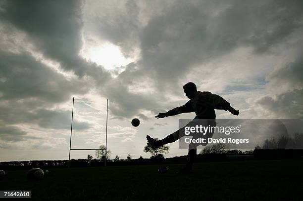 Silhouette of England and Newcastle Falcons Fly Half Jonny Wilkinson as he practises his kicking at Kingston Park during a feature on May 13, 2004 in...