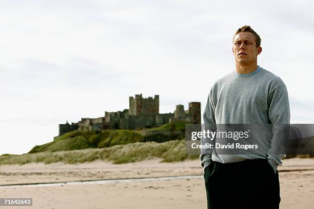 England and Newcastle Falcons Fly Half Jonny Wilkinson poses for a portrait near the Castle at Bamburgh Beach during a feature on May 14, 2004 in...