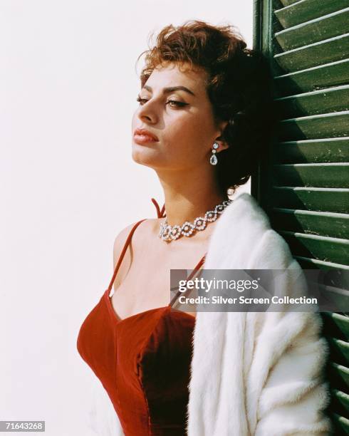 Italian actress Sophia Loren in a fur coat and diamond necklace, circa 1965.