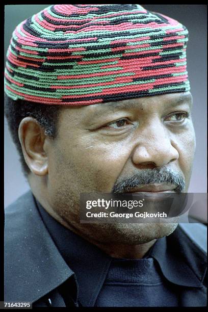 Former Cleveland Browns running back and member of the Pro Football Hall of Fame, Jim Brown, watches the action from the sideline during a game...