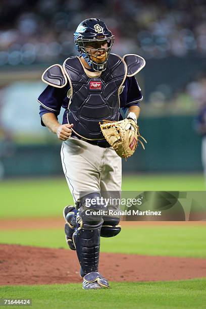 Catcher Josh Bard of the San Diego Padres jogs on the field against the Houston Astros on August 13, 2006 at Minute Maid Park in Houston, Texas.