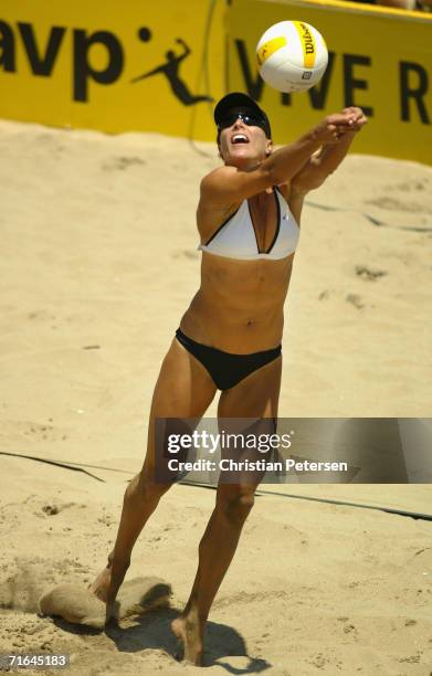 Nancy Mason passes the ball during the AVP Manhattan Beach Open final match on August 12, 2006 in Manhattan Beach, California. Misty May-Treanor and...