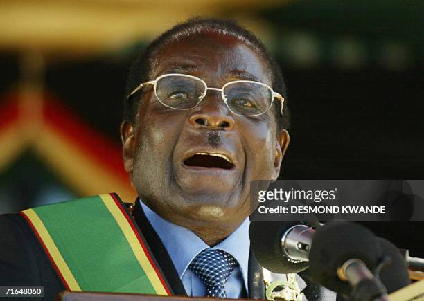 Zimbabwean President and Commander-in Chief of the Zimbabwe defence force president Rorbet Mugabe speaks 15 August 2006, at the Zimbabwe Defence...
