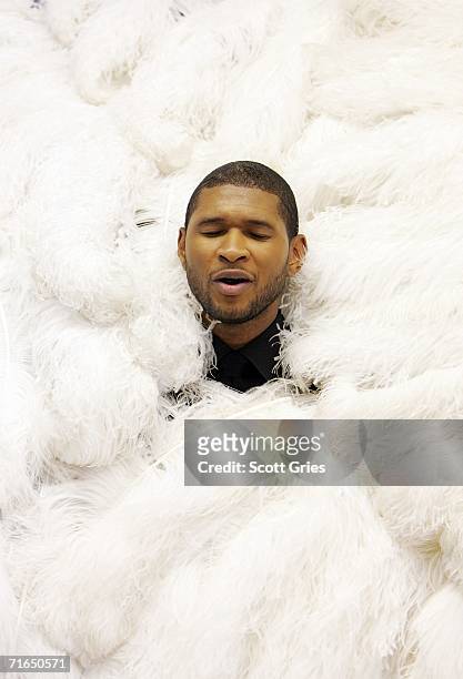 Singer/actor Usher Raymond rehearses for his upcoming Broadway debut as Billy Flynn in "Chicago" at Ripley Grier Studio on August 15, 2006 in New...