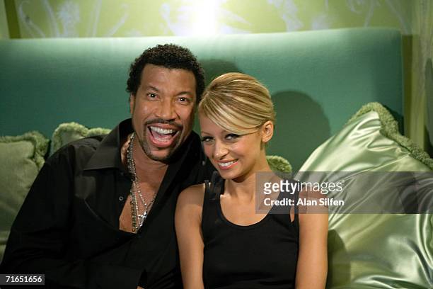 Singer Lionel Richie and his daughter actress Nicole Richie appear on the set of his "'I Call It Love"' video shoot on July 23, 2006 in Hollywood,...
