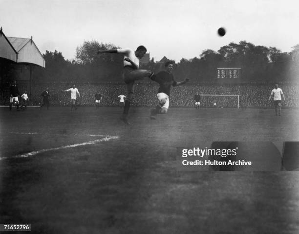 Action from Woolwich Arsenal vs Bury at the Arsenal Stadium in Highbury, 4th October 1913, during the first season at the club's new home in North...