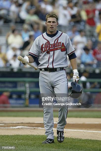 Outfielder Jeff Francoeur of the Atlanta Braves returns to the dugout after batting against the Pittsburgh Pirates at PNC Park on August 1, 2006 in...