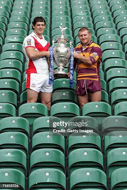Paul Wellens of St Helens and Brad Drew vice captain of Huddersfield Giants pose with the Powergen cup during the Powergen Challenge Cup Final Media...