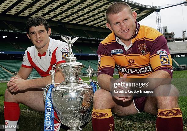 Paul Wellens of St Helens and Brad Drew vice captain of Huddersfield Giants pose with the Powergen cup during the Powergen Challenge Cup Final Media...