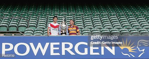 Paul Wellens of St Helens and Brad Drew vice captain of Huddersfield Giants pose with the Powergen cup during the Powergen Challenge Cup Final Media...