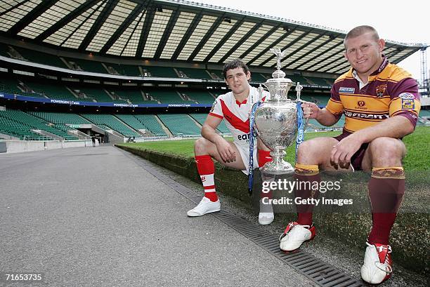 Paul Wellens of St Helens and Brad Drew , vice captain of Huddersfield Giants pose with the Powergen cup on August 16, 2006 in London, England.