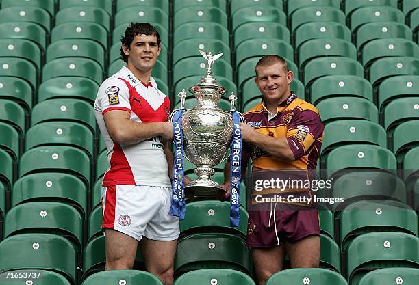 Paul Wellens of St Helens and Brad Drew, vice captain of Huddersfield Giants, pose with the Powergen cup during the Powergen Challenge Cup Final...